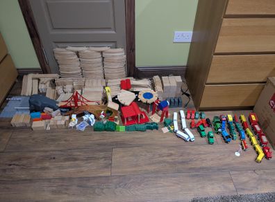 Large collection of wooden train tracks