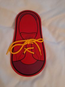 Lace tieing toy