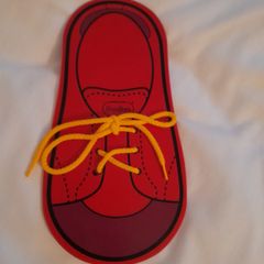 Lace tieing toy