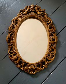 Vintage cherub mirror