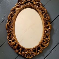 Vintage cherub mirror