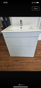 bathroom vanity unit and basin