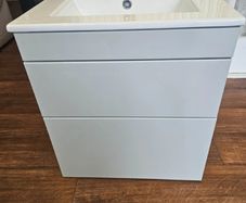 bathroom vanity unit and basin