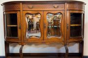 Early 20th Century Bow Front Walnut Display Cabinet with Beveled Glass Doors