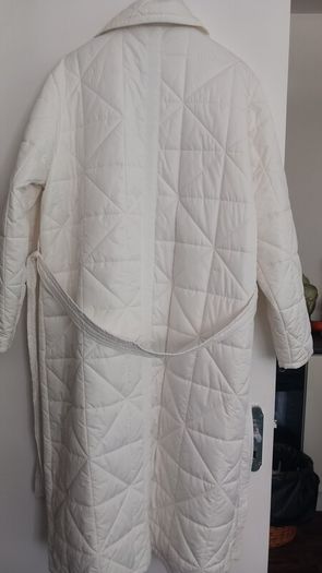 Capsule White Quilted Longline Coat.