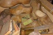 Antique wooden clogs and clog making tools