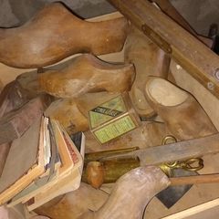Antique wooden clogs and clog making tools