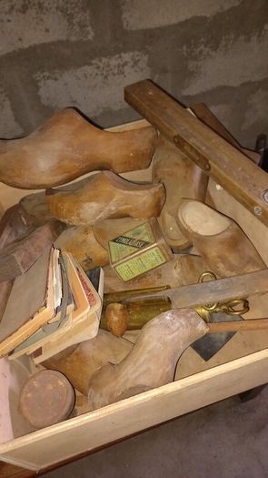 Antique wooden clogs and clog making tools
