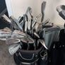 A selection of golf clubs and bags. Image 3