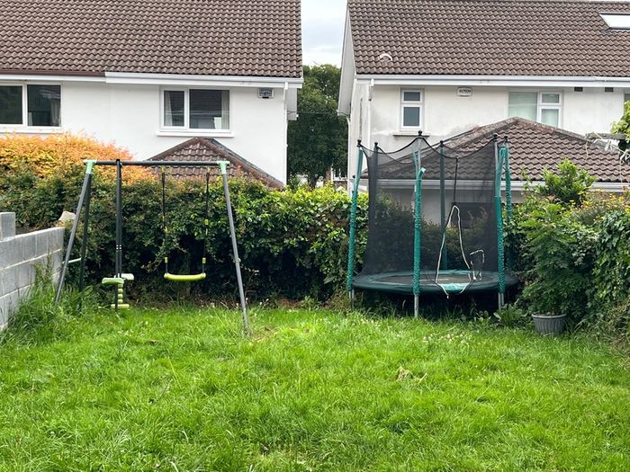 swing set and trampoline