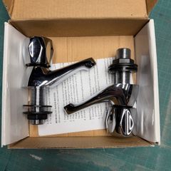 Chrome basin bathroom taps