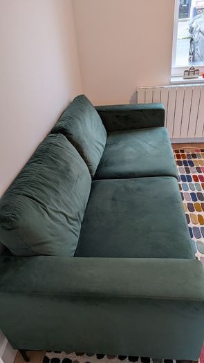 Three seater green velvet couch