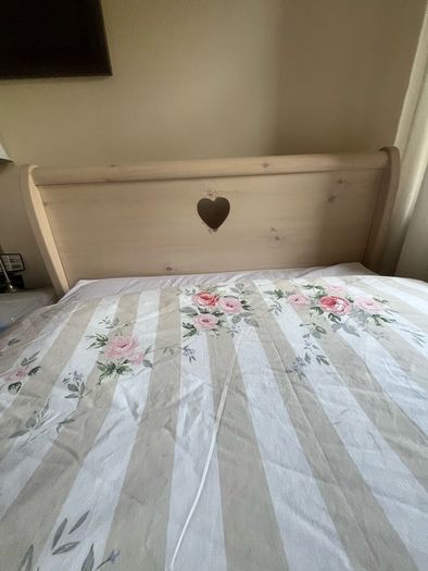 Beautiful cream single sleigh bed. Mattress included.