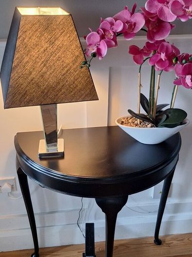 Hall table with lamp and orcid ornament