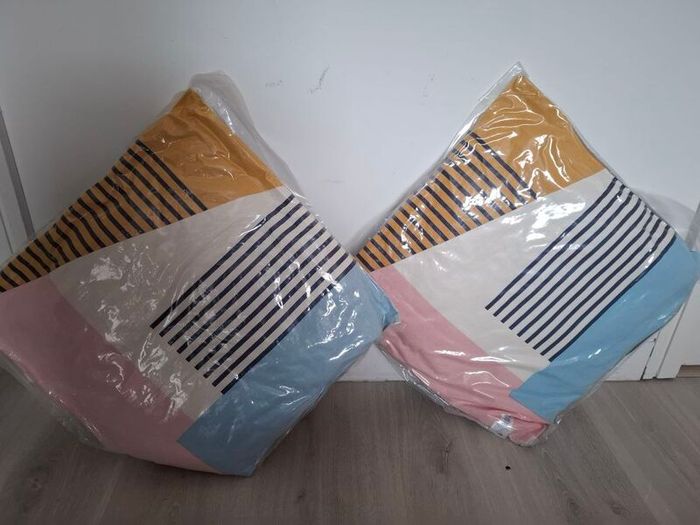 2 new multi Cushions