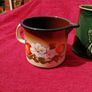 Retro Mid Century Milk pot or jug.  Enamel dark brown and orange with a floral pattern! Image 10