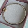 Pandora Moments two-tone bangle ir sterling silver with a 14k yellow gold ball clasp. (Size approx 19cm) for the right size please check all the photos (the bracelet is in very good condition) Image 2