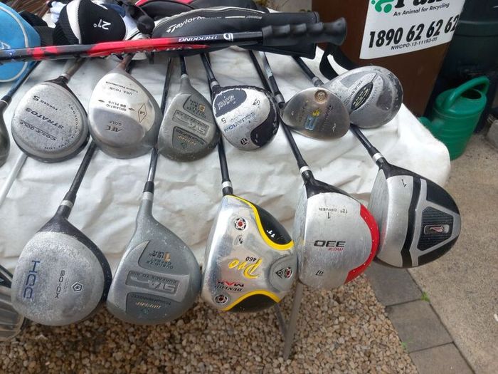 A selection of golf clubs and bags. NOT SELLING SEPARATE