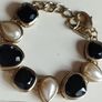 A beautiful gold-tone bracelet. Image 7