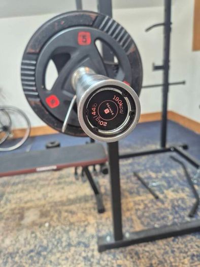 Home Gym set up w/ plates and kettlebells