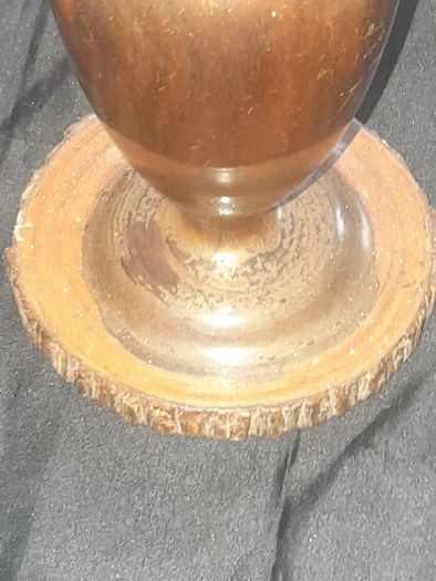A Beautiful Vintage Wooden Vase made from a single piece of wooden log has been carefully turned on a lathe to create this urn shaped vase. Original bark details remain around the base