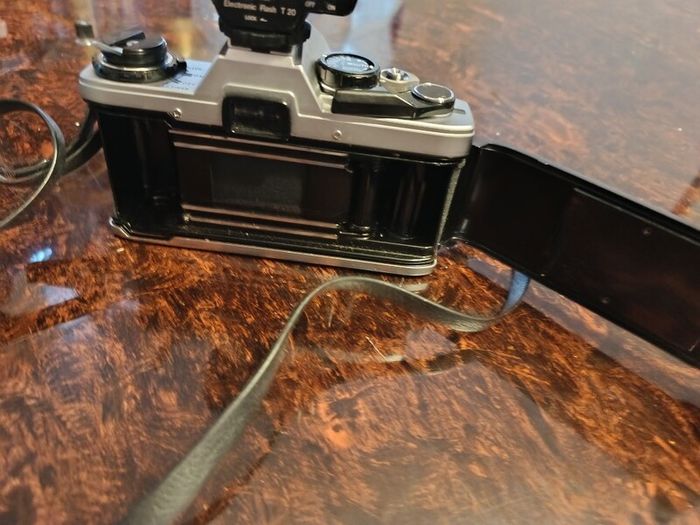 Olympus OM 10 camera with flash