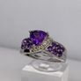A beautiful silver ring with amethysts. Image 4