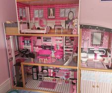 Barbie house, dolls and accessories