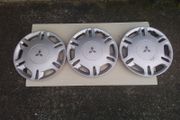 3. Mitsubishi 13 Inch Wheel Covers.