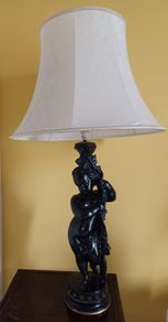 Lamp with figure of boy