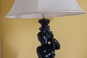Lamp with figure of boy