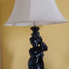Lamp with figure of boy
