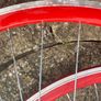 Red Bicycle Wheelset - Fixie/Singlespeed/FixedGear/Track Bike (FlipFlop Rear Hub) Sealed Bearings - Massively Discounted due to Cosmetic Flaws - Red Rims with Silver Spokes and Hubs. Image 3