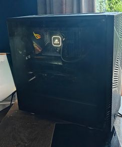 High end VR gaming PC with VR headset and AIO water cooling