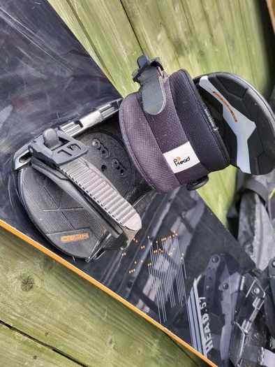 snowboard, bindings and bag