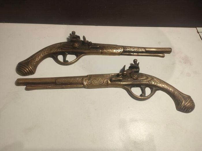 A pair of Early 20th Century 13" Brass Flintlock pistols