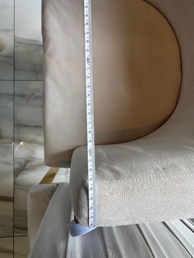 Cream and gold armchairs
