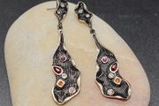 Beautiful pair earrings by R'Laith black wine color gold