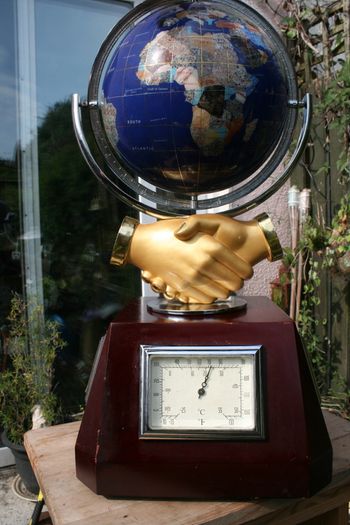 Vintage  Stone  global shape turnable 3 sides with clock, thermometer and hydrometer H 21"