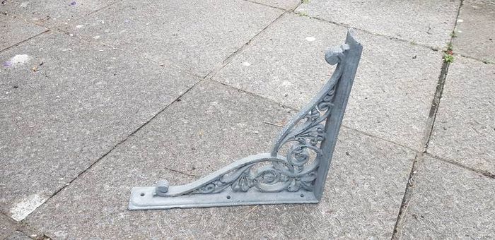 antique shelf support/hanging basket holder.