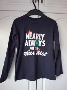Dunnes Nearly Always on the Nice List lightweight long-sleeved top (6-7 years)