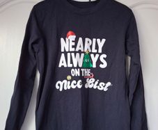 Dunnes Nearly Always on the Nice List lightweight long-sleeved top (6-7 years)