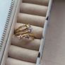 The ring has a unique stacked design with several bands and beautiful pastel/coloured stones, including purple, green and champagne tones. The hallmark has worn away over time, but the ring was tested today and confirmed as genuine 14K gold weight 3.95g. Image 8