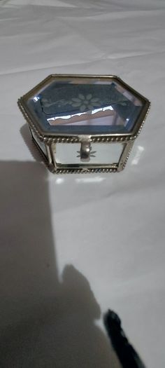 Lovely jewellery box ,,with bevelled mirrors sides and design, see pictures for condition,,take as is ,buyer collects or pays postage thank you