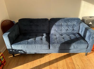 blue velvet sofa