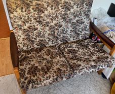 two seat love seat sofa, floral pattern - one cushion damaged