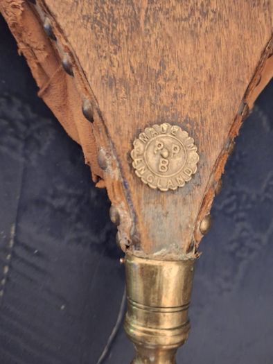 Vintage bellows featuring a brass front