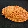 Carved wooden cicada. Image 2