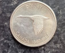 Two Canadian Silver Dollars 1867-1967