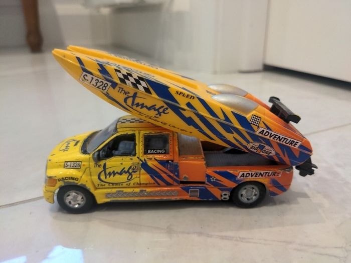 Toy jeep and speed boat